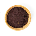 Wooden bowl filled with Freeze-Dried Vitality Blend, showing the texture of the vegetable blend